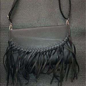 Cross body purse. Fringe front
